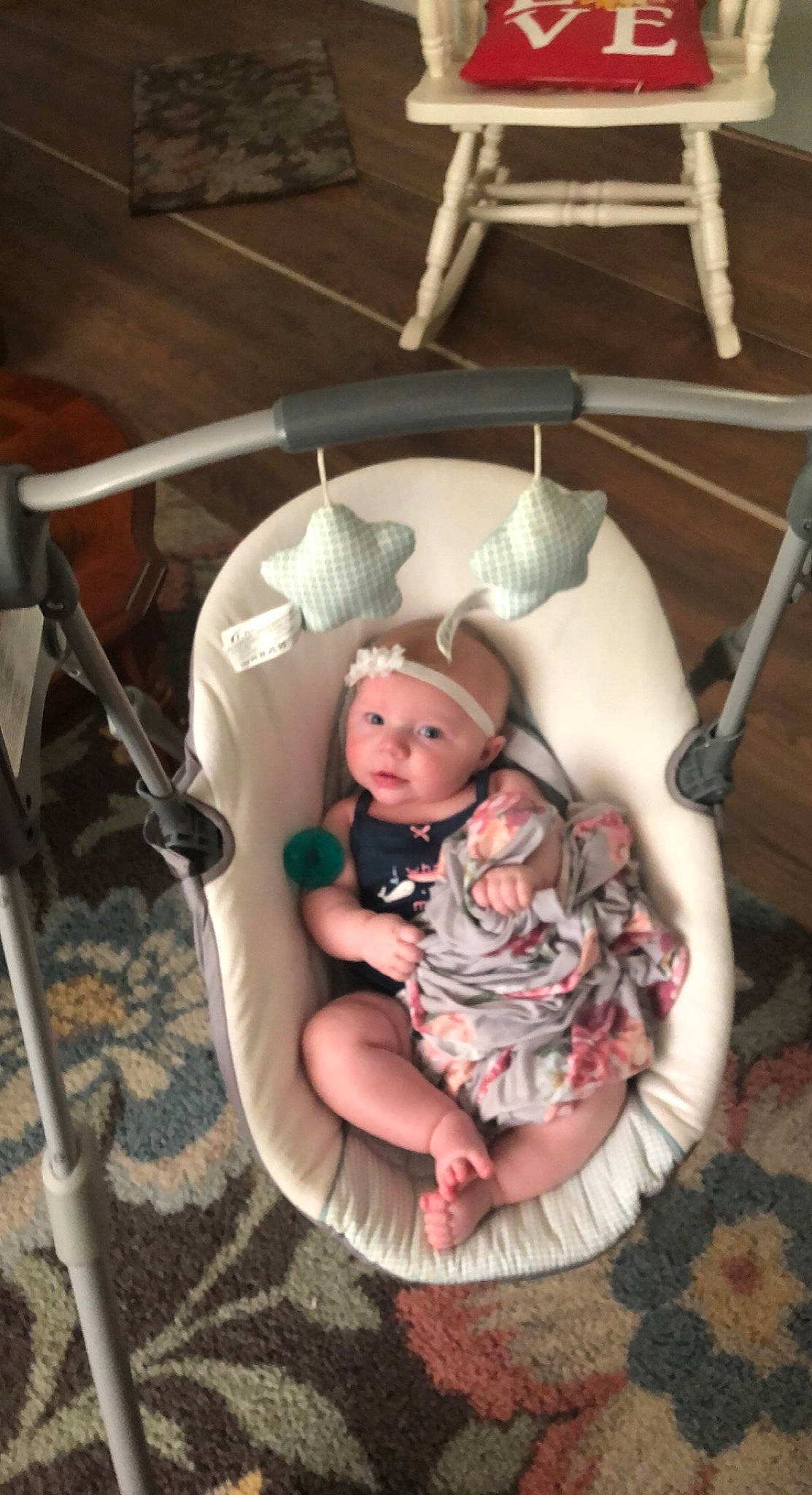 Naomi is registered to the contest to win money with this photo: baby, baby_carriage, baby_products, baby_safety, baby_toddler_clothing, baby_toys, bed, chair, child, circle, comfort, flooring, fun, headwear, infant_bed, linens, pattern, person, room, sitting