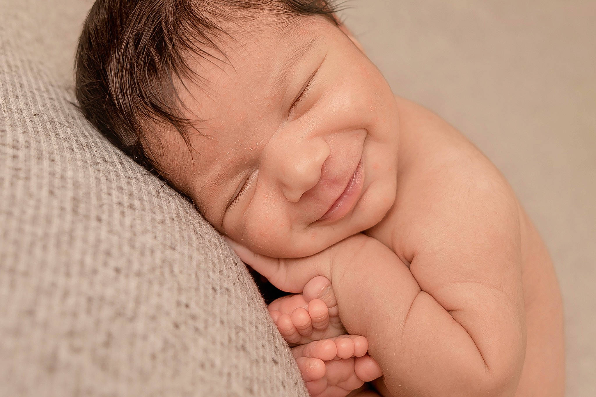 Kory is registered to the contest to win money with this photo: baby, child, comfort, face, finger, flesh, gesture, happy, joy, linens, nail, nose, person, portrait_photography, skin, thumb, toddler, wrinkle