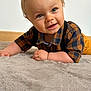 Elijah a rejoint le concours — aidez-le/la à gagner de superbes lots ! baby, child, infant, blue_eyes, checkered_shirt, suspenders, carpet, floor, smile, curious, crawling, cute, indoor, portrait, skin, hair, hand, face, clothing, young