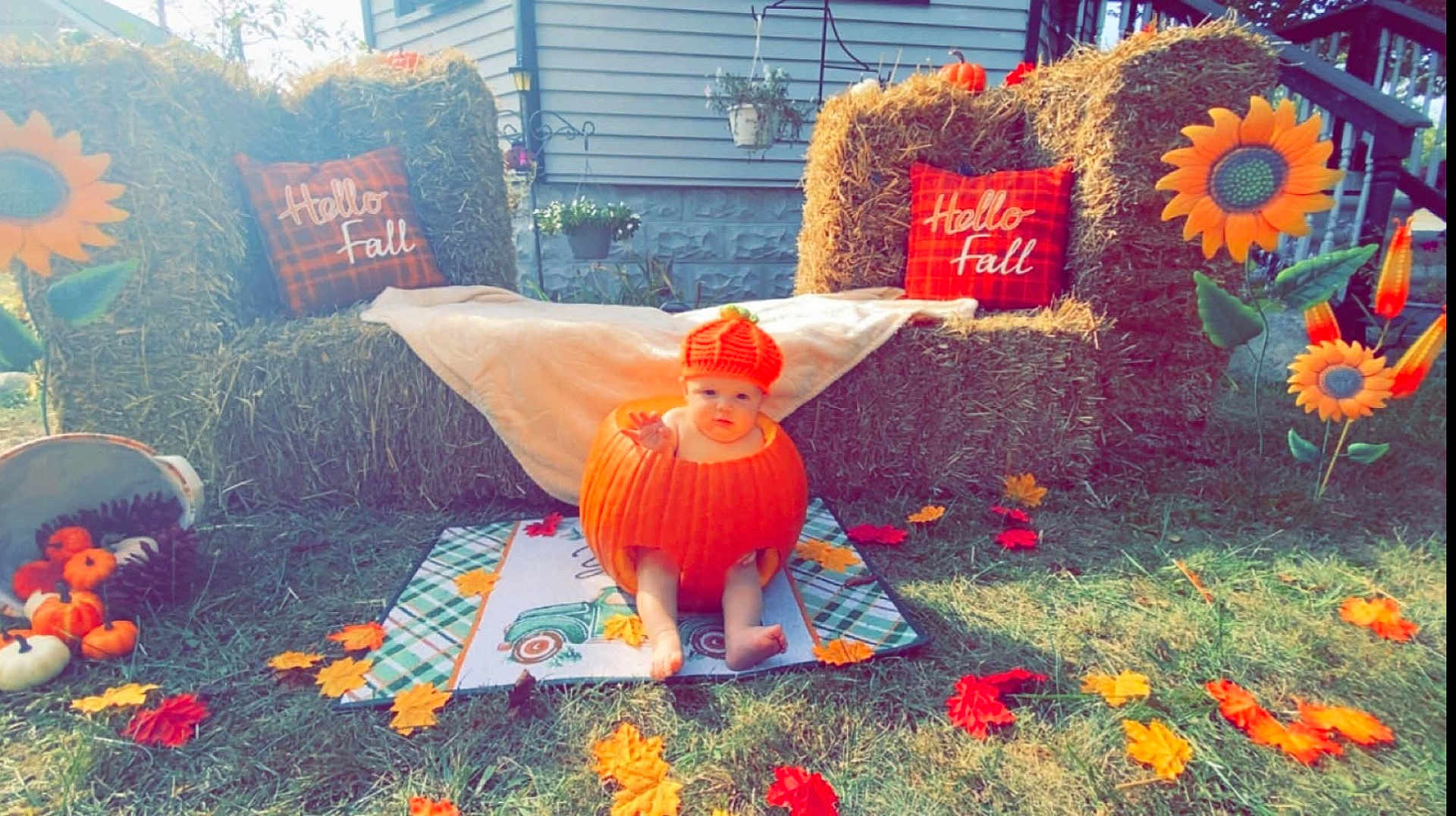 Steven Jr joined the competition — help win amazing prizes! baby, pumpkin, fall, autumn, hay_bales, orange, leaves, grass, decorations, hat, plaid, outdoor, seasonal, cute, child, holiday, festival, smiling, nature, celebration