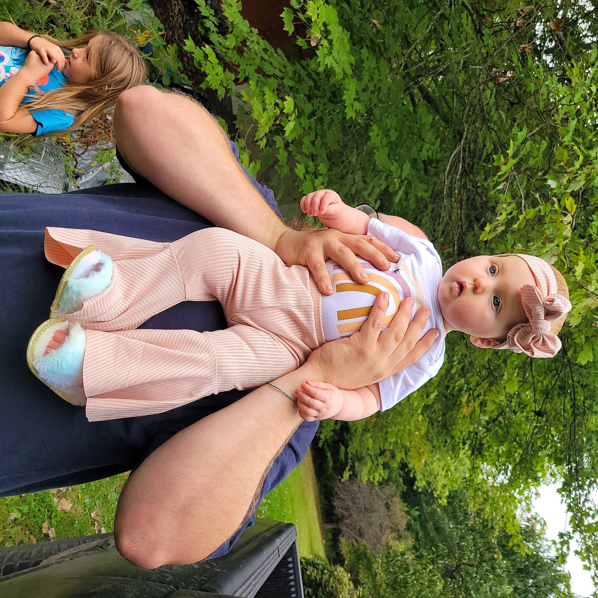 Kaisley is registered to the contest to win money with this photo: arm, art, cool, eyewear, finger, fun, gesture, grass, happy, headwear, human_leg, joint, knee, leisure, people_in_nature, person, pink, street_fashion, thigh, tree