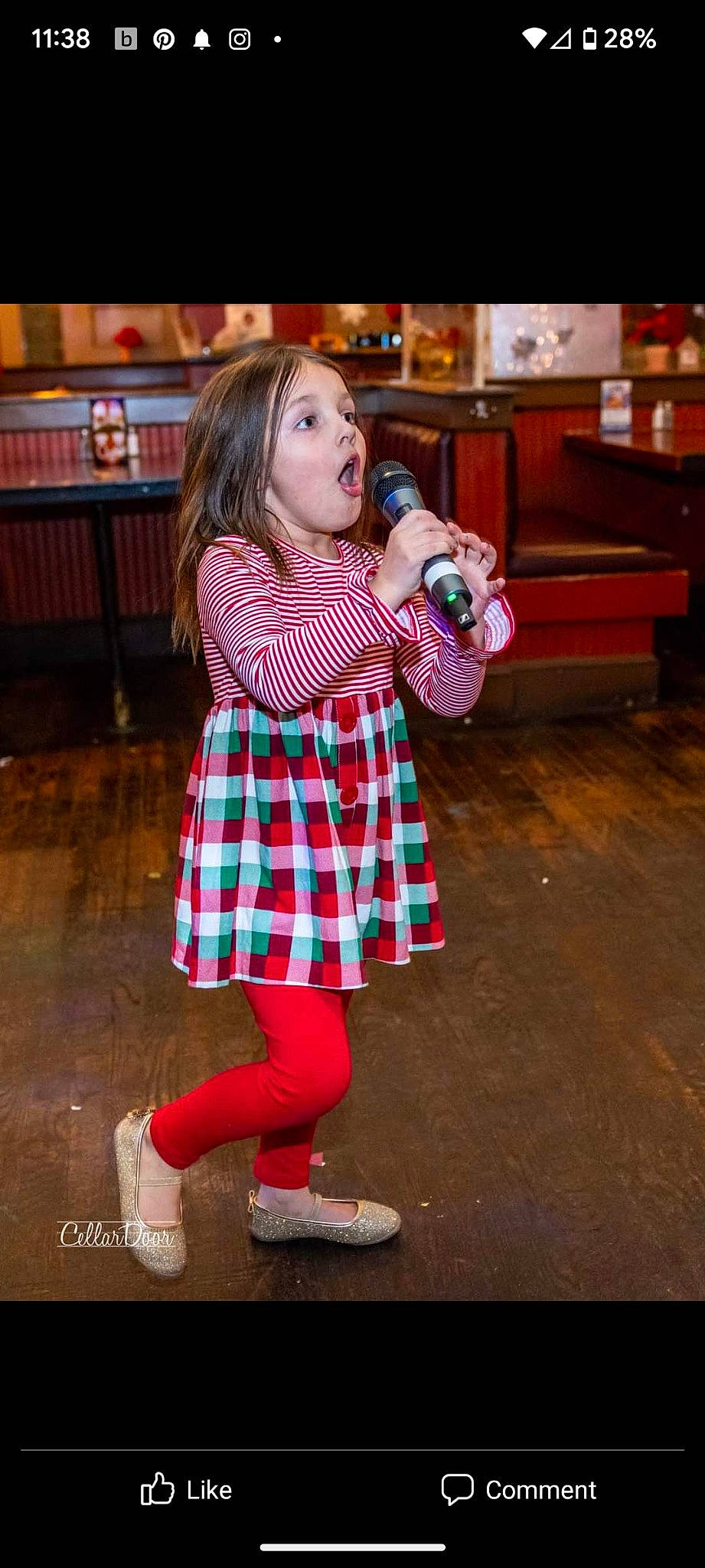 Caraline joined the competition — help win amazing prizes! boot, child, christmas, entertainment, event, face, flooring, fun, happy, holiday, human_leg, knee, pattern, person, plaid, sock, surprise, tartan, tie, toddler