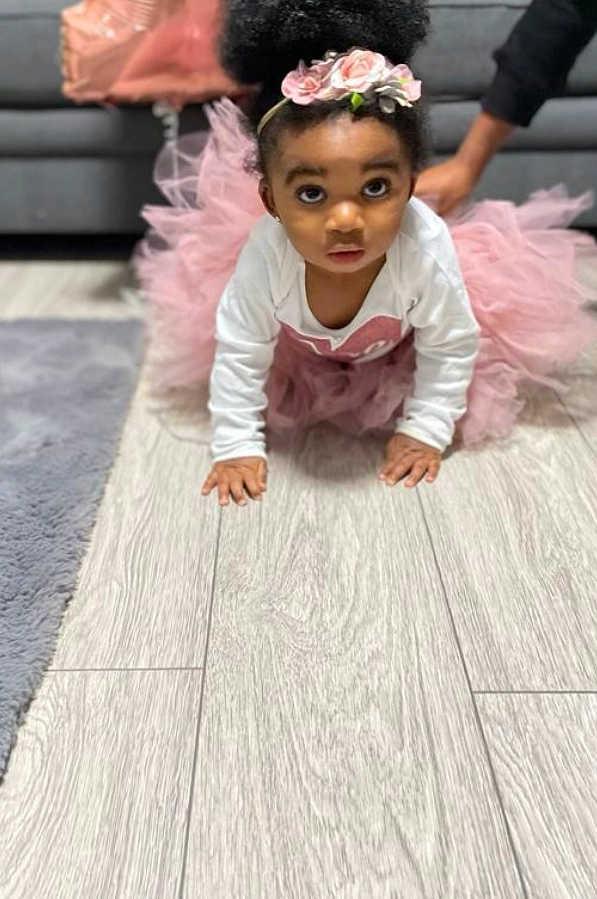 Arielle joined the competition — help win amazing prizes! dress, event, eye, face, floor, flooring, flower, fun, grass, hair, happy, head, headpiece, jewellery, leisure, person, petal, pink, skin, toddler