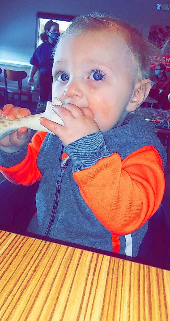 Carter is registered to the contest to win money with this photo: baby, baby_toddler_clothing, child, eating, food_craving, kitchen_utensil, person, sweater, taste, toddler