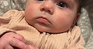 Shelby joined the competition — help win amazing prizes! baby, blanket, bodypart, clothing, couch, face, finger, furniture, hand, happy, head, knitwear, newborn, pants, person, photography, portrait, quilt, smile, sweater