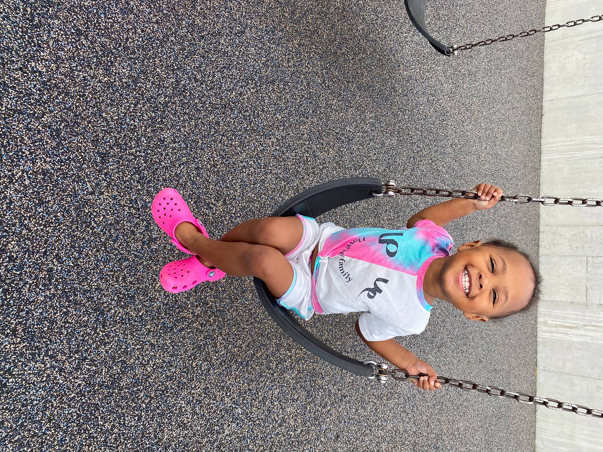 Alaia joined the competition — help win amazing prizes! asphalt, child, concrete, fun, human_leg, joy, knee, leisure, magenta, person, pink, play, recreation, road, road_surface, shorts, sidewalk, smile, t_shirt, tar