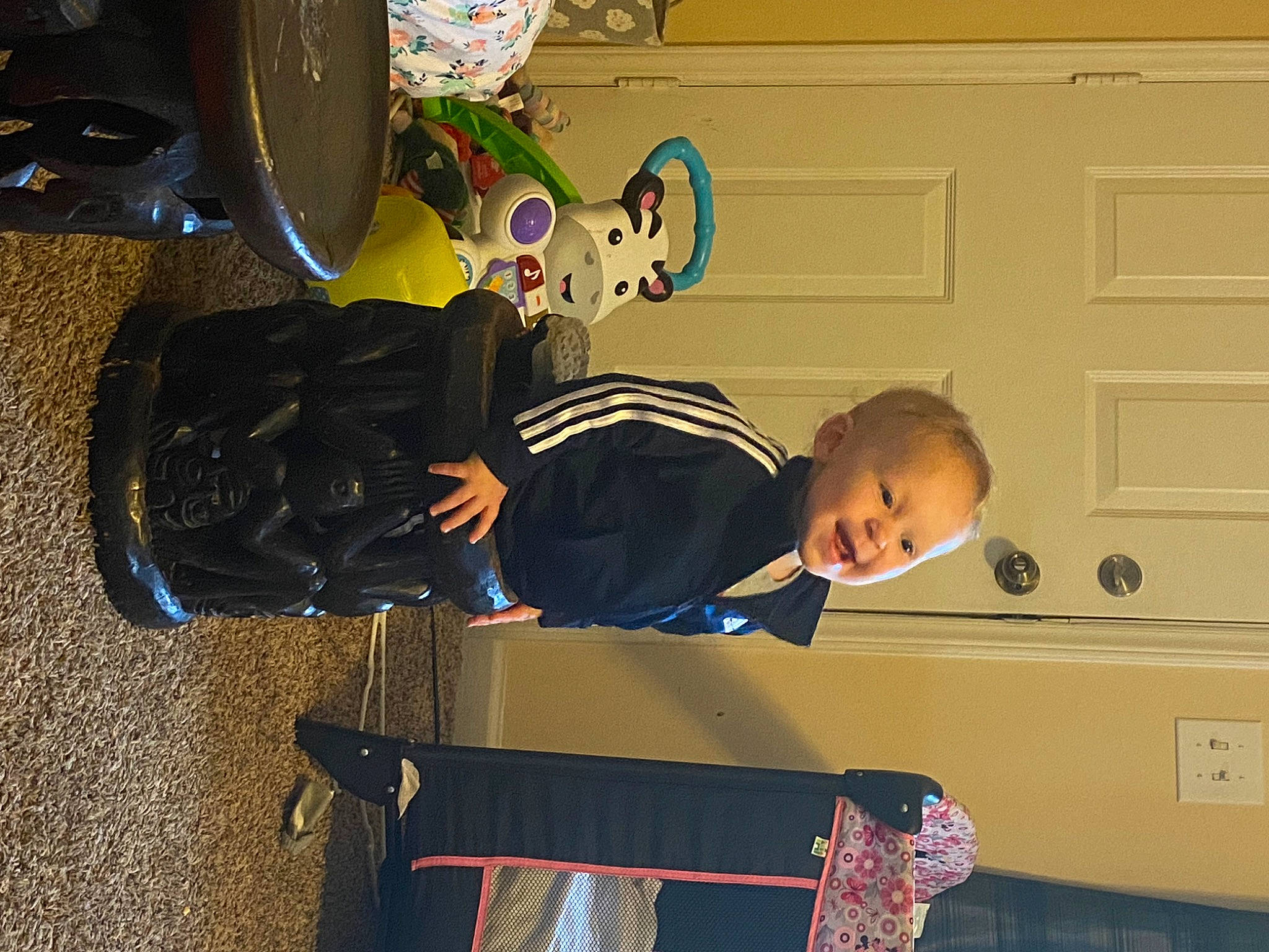 Khalil joined the competition — help win amazing prizes! child, comfort, door, fun, mechanical_fan, person, play, room, sitting, toddler, toy