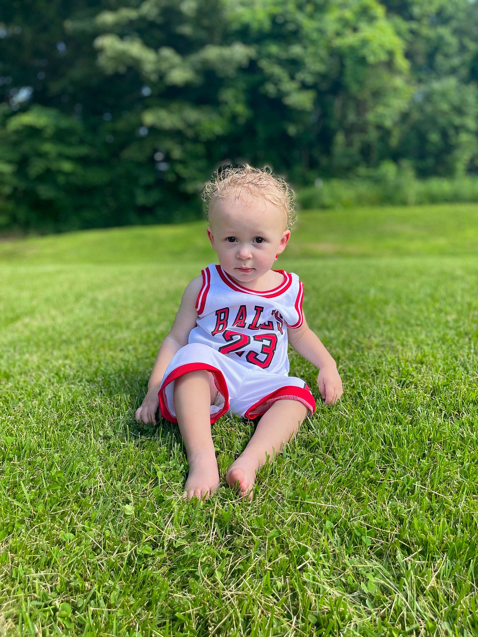 Khalil joined the competition — help win amazing prizes! baby, baby_toddler_clothing, child, fun, grass, grass_family, grassland, happy, leisure, meadow, people_in_nature, person, plant, prairie, recreation, sitting, sleeve, smile, t_shirt, toddler