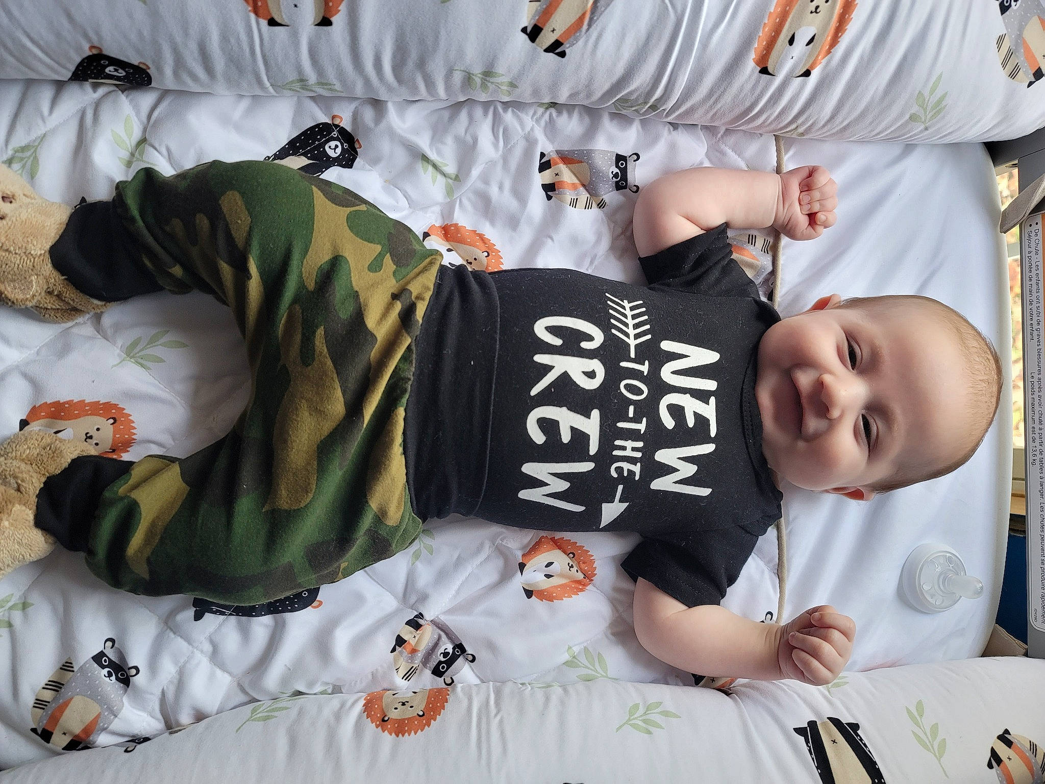 Zaidyn is registered to the contest to win money with this photo: baby, baby_toddler_clothing, child, comfort, cool, gesture, happy, joy, linens, mammal, pattern, people, person, product, room, sleeve, snapshot, t_shirt, textile, toddler