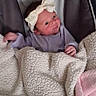 Ambria joined the competition — help win amazing prizes! baby, infant, blanket, headband, bow, cushion, seat, clothing, face, person, newborn, soft, cute, cozy, indoors, pink, purple, smile, child, portrait