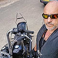 Denis L.