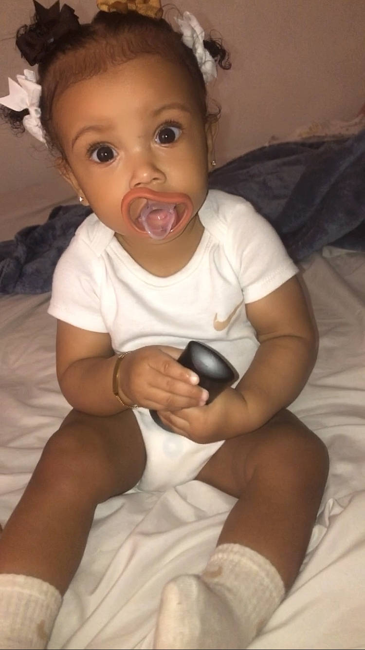 Divine joined the competition — help win amazing prizes! baby, bodypart, couch, face, finger, furniture, hand, happy, head, hockey, icehockey, icehockeypuck, indoors, person, photography, portrait, rink, sitting, skating, sport