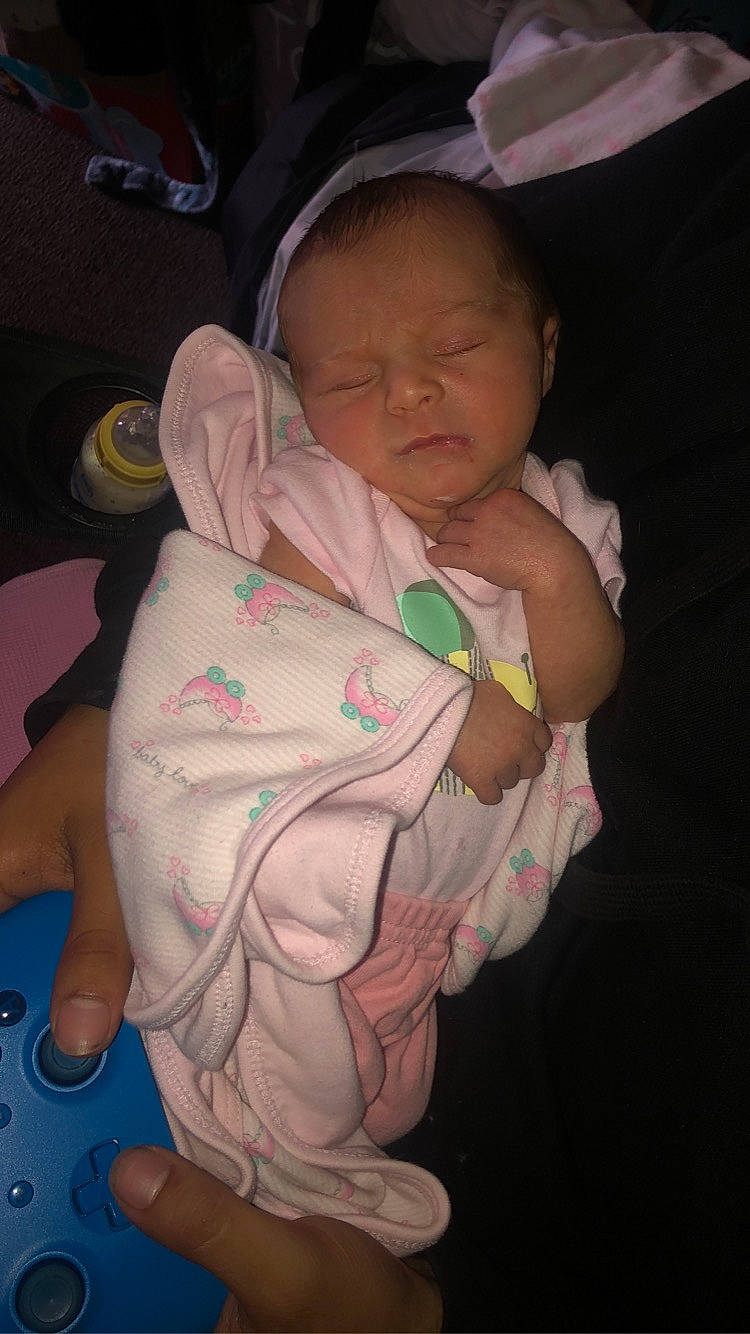 Lylah is registered to the contest to win money with this photo: baby, baby_toddler_clothing, cheek, chest, child, comfort, ear, elbow, finger, fun, mammal, mouth, nail, nose, person, pink, skin, sleeve, thumb, toddler