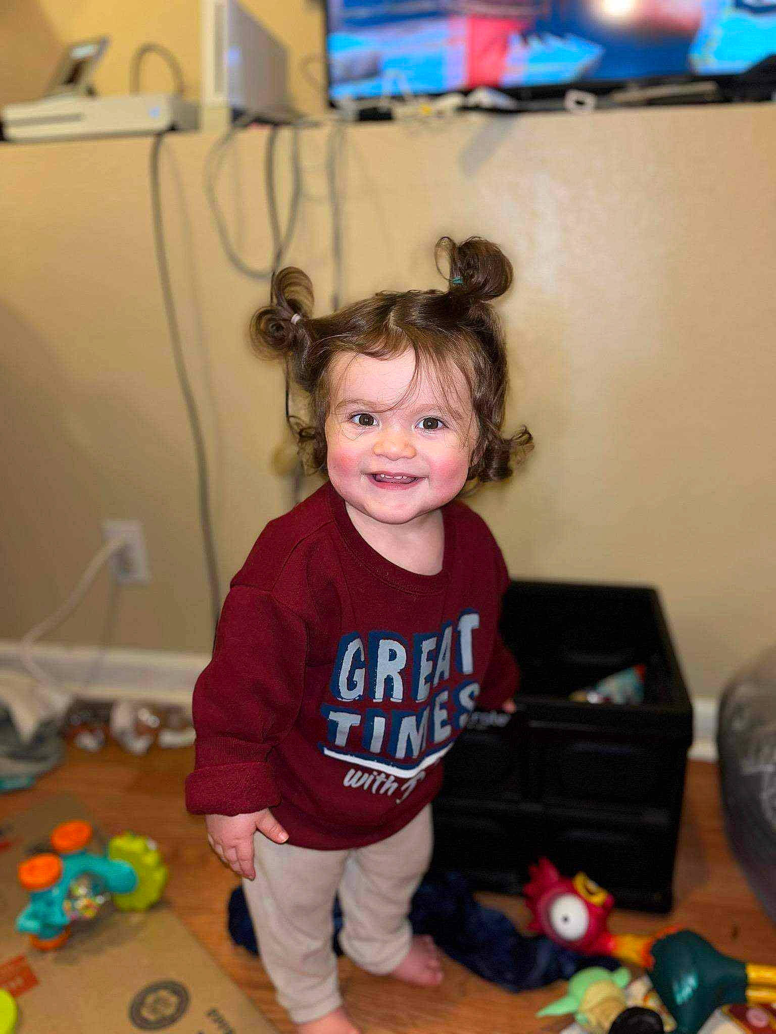 Lylah is registered to the contest to win money with this photo: baby, baby_toddler_clothing, child, event, floor, flooring, fun, happy, holiday, joy, leisure, party, people, person, play, room, smile, sock, t_shirt, toddler