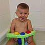Ayden participe au concours pour gagner de l'argent avec cette photo : baby, bath, bathtub, bath_seat, child, smiling, toy, water, splash, happy, tiled_wall, indoor, skin, head, face, person, sitting, playful, cute, bathroom