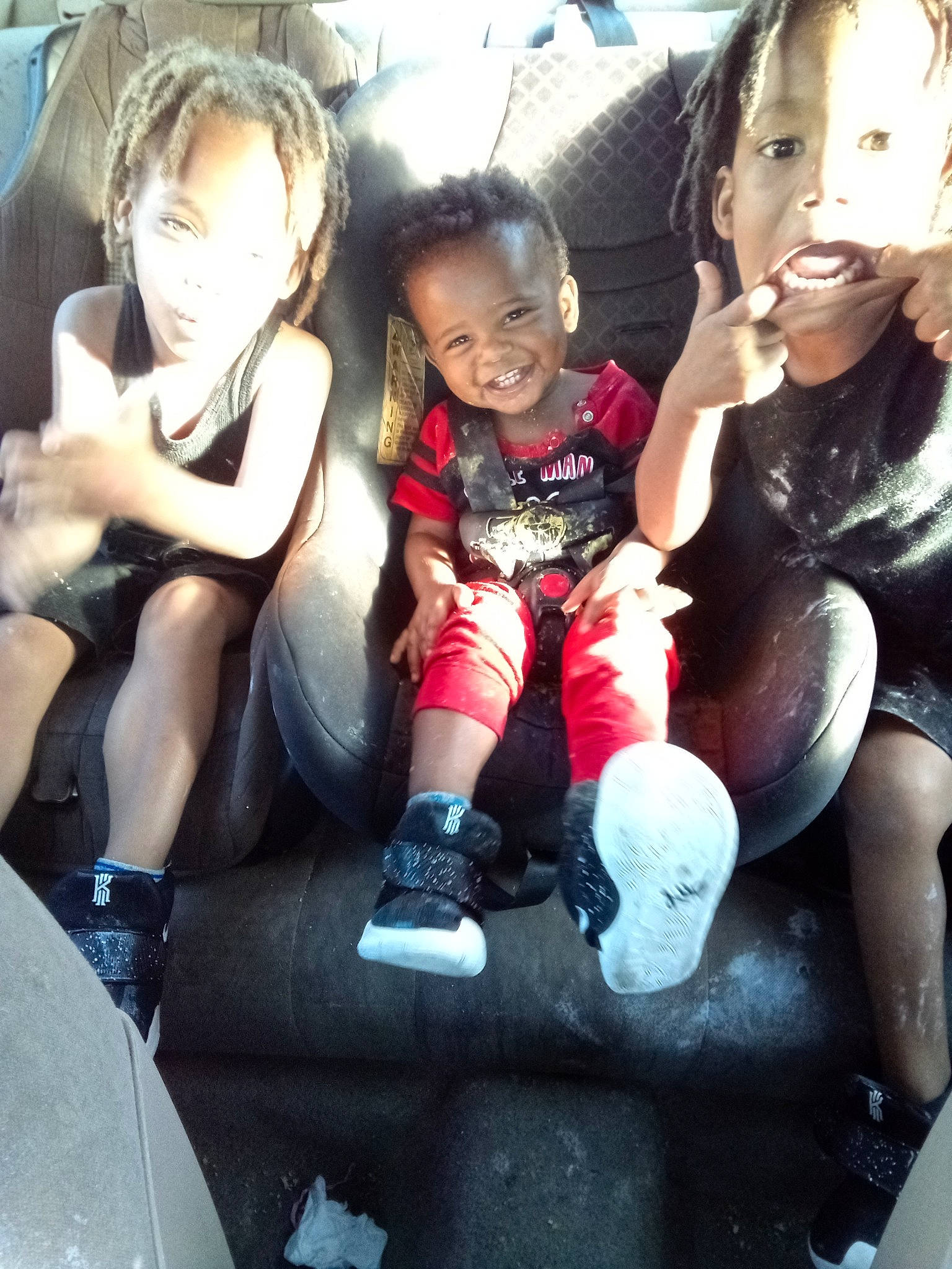 Dontae joined the competition — help win amazing prizes! black_hair, child, cool, family_car, friendship, fun, happy, joy, leg, person, play, sibling, sitting, smile, thigh, toddler