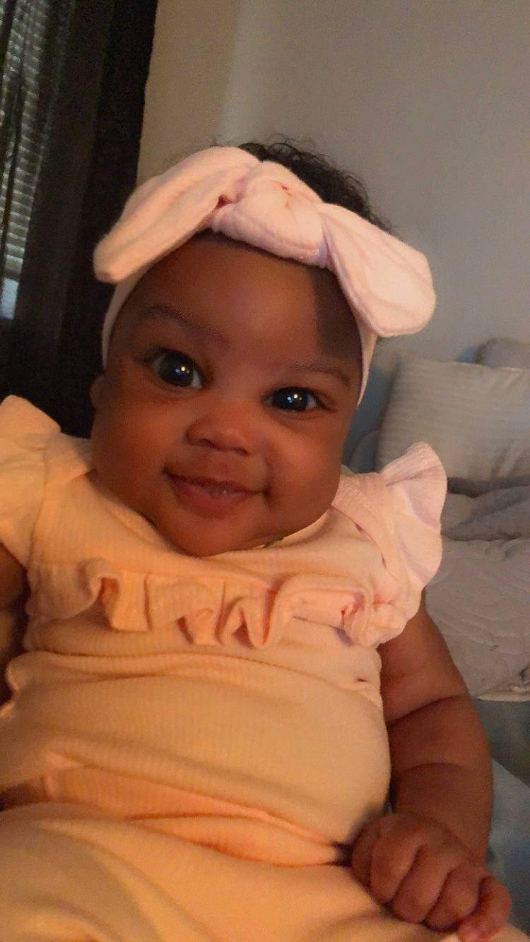 Sanaiya is registered to the contest to win money with this photo: arm, cheek, chin, comfort, eye, eyebrow, forehead, happy, headwear, human_body, iris, jaw, lip, mouth, nose, person, pink, skin, sleeve, smile