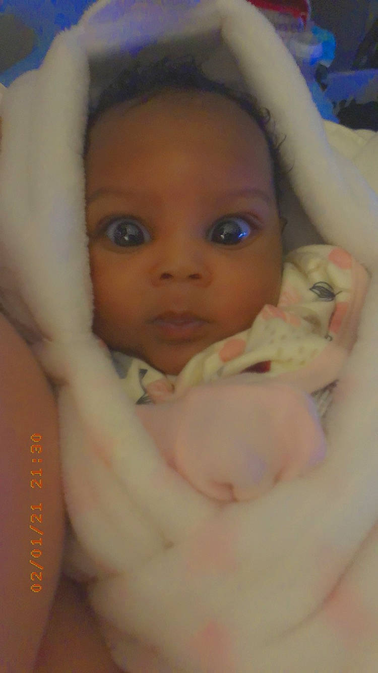 Sanaiya is registered to the contest to win money with this photo: baby, cheek, chest, chin, eye, eyebrow, eyelash, finger, forehead, gesture, happy, human_body, iris, lip, mouth, nose, person, skin, smile, thumb