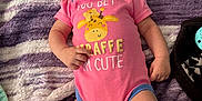 Hayvin joined the competition — help win amazing prizes! baby, blanket, casual, child, cute, diaper, foot, giraffe_graphic, hand, human, indoor, infant, lying_down, onesie, pacifier, pink_clothing, playful, purple_blanket, soft_texture, tongue_out