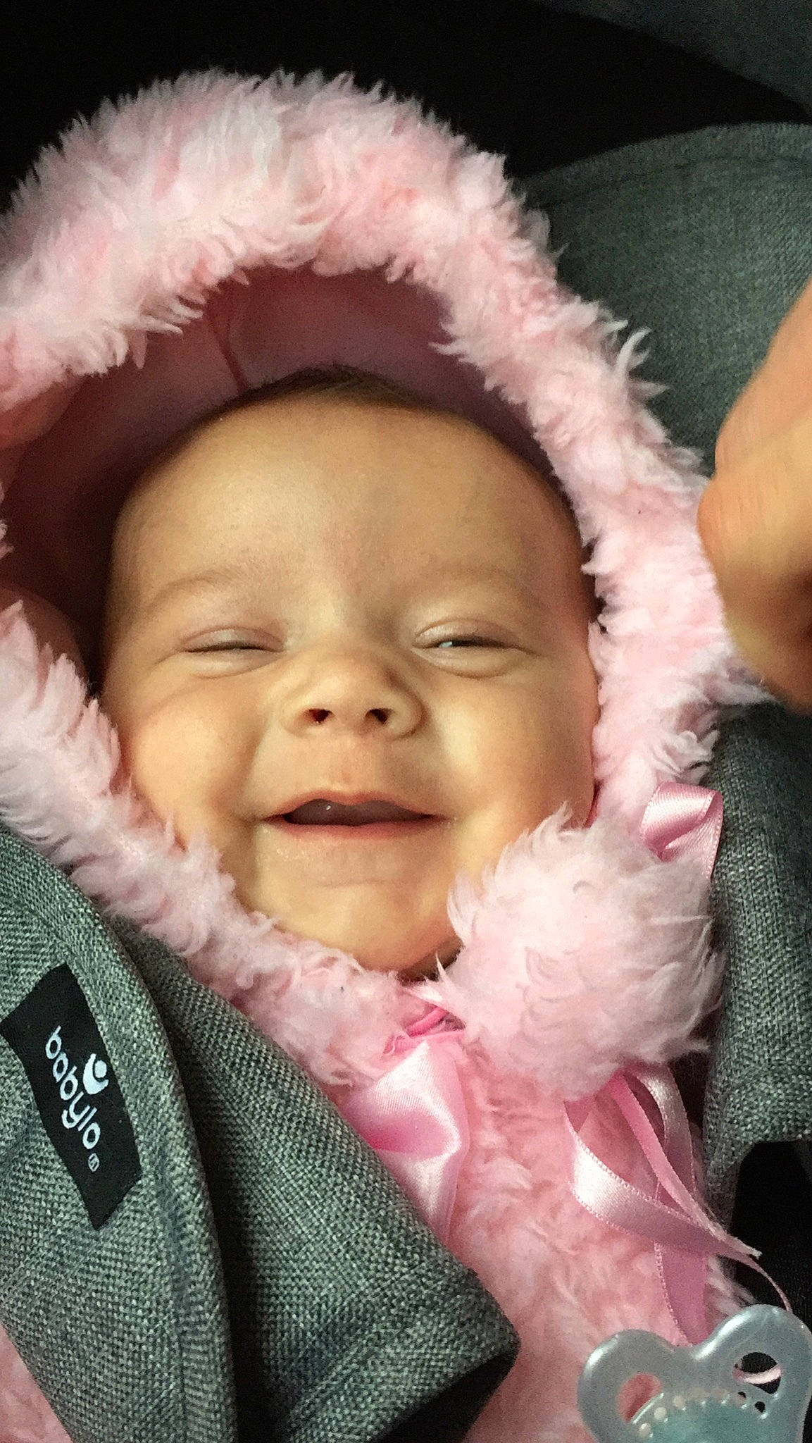 Lilly is registered to the contest to win money with this photo: baby, cheek, child, chin, eye, eyebrow, face, facial_expression, forehead, fun, happy, head, lip, mouth, nose, person, photography, pink, skin, smile