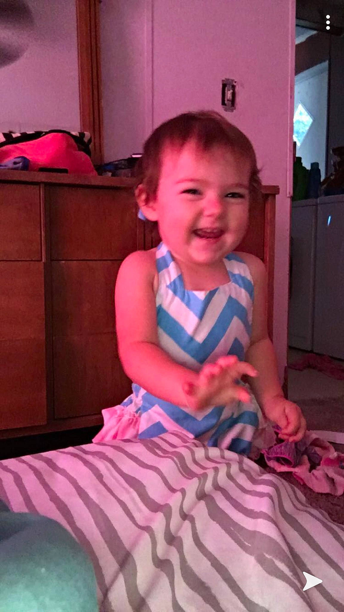 Ally is registered to the contest to win money with this photo: baby, baby_toddler_clothing, cheek, child, joy, person, pink, sitting, smile, toddler