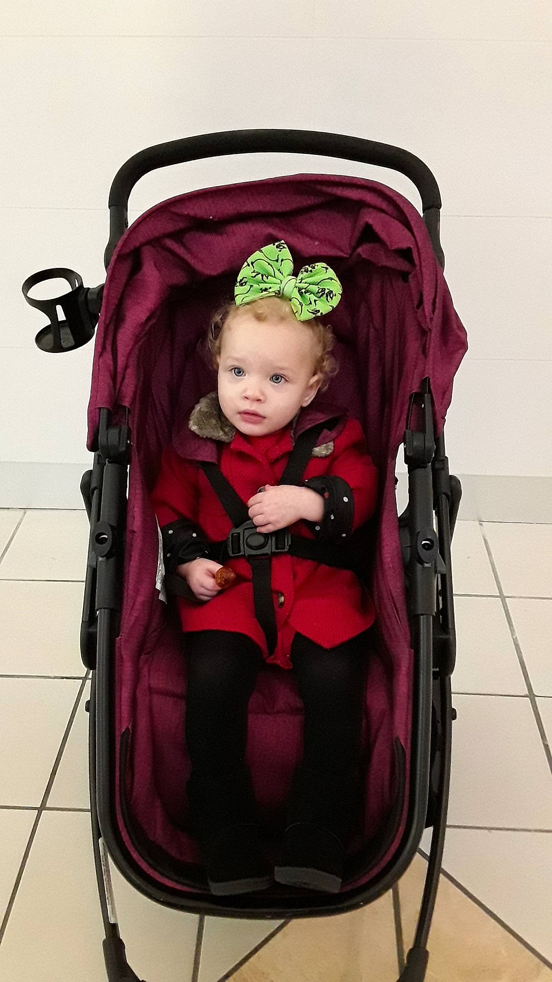 Roselina joined the competition — help win amazing prizes! baby, baby_carriage, baby_products, baby_safety, baby_toddler_clothing, baggage, black, cheek, lap, person, product, strap, tile, tile_flooring