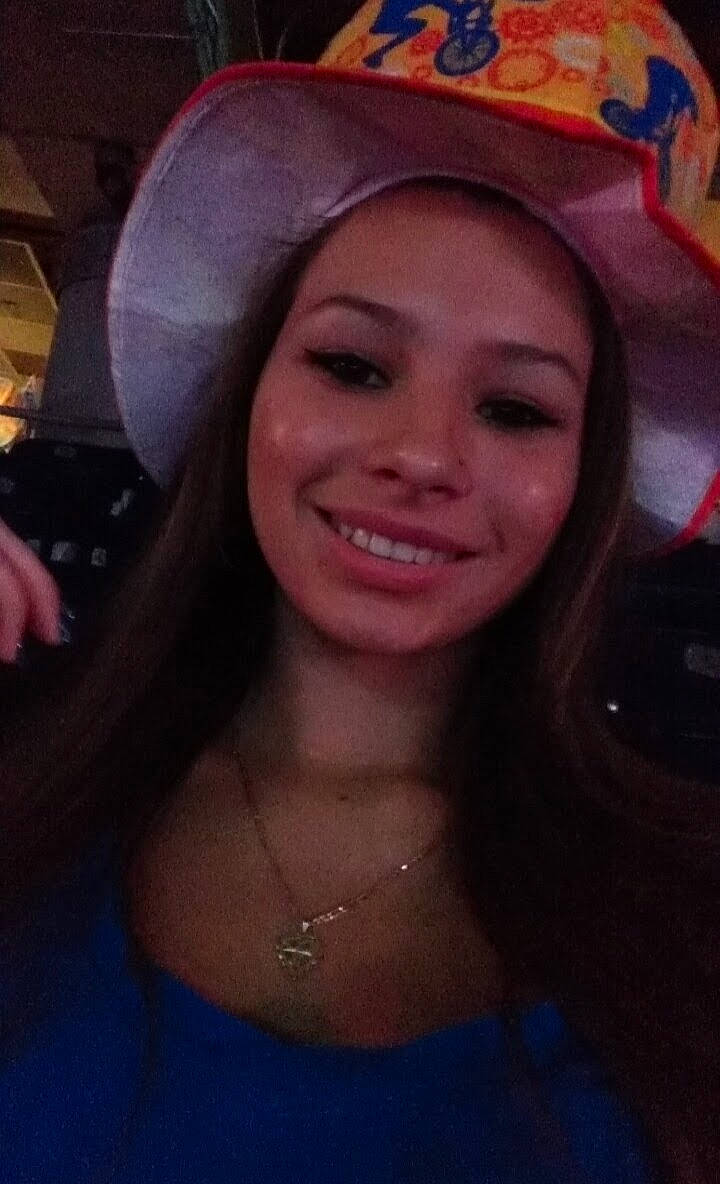 Abby is registered to the contest to win money with this photo: body_jewelry, chin, cobalt_blue, cool, costume_accessory, costume_hat, electric_blue, eyebrow, facial_expression, fashion_accessory, fun, headgear, jewellery, joy, laugh, lip, person, selfie, sun_hat, throat