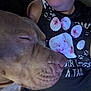 Riggs joined the competition — help win amazing prizes! animal, brown_dog, closeup, comfort, cozy, dog, ear, face, human, indoor, mouth, nose, paw_print, person, pet, rest, shirt, sleeping, snuggling, text