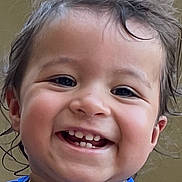 Jeremiah joined the competition — help win amazing prizes! blue_shirt, camera, child, closeup, curly_hair, decoration, elephant, face, happy, head, indoors, joyful, person, playful, portrait, smiling, teeth, toddler, vertical_photo, water