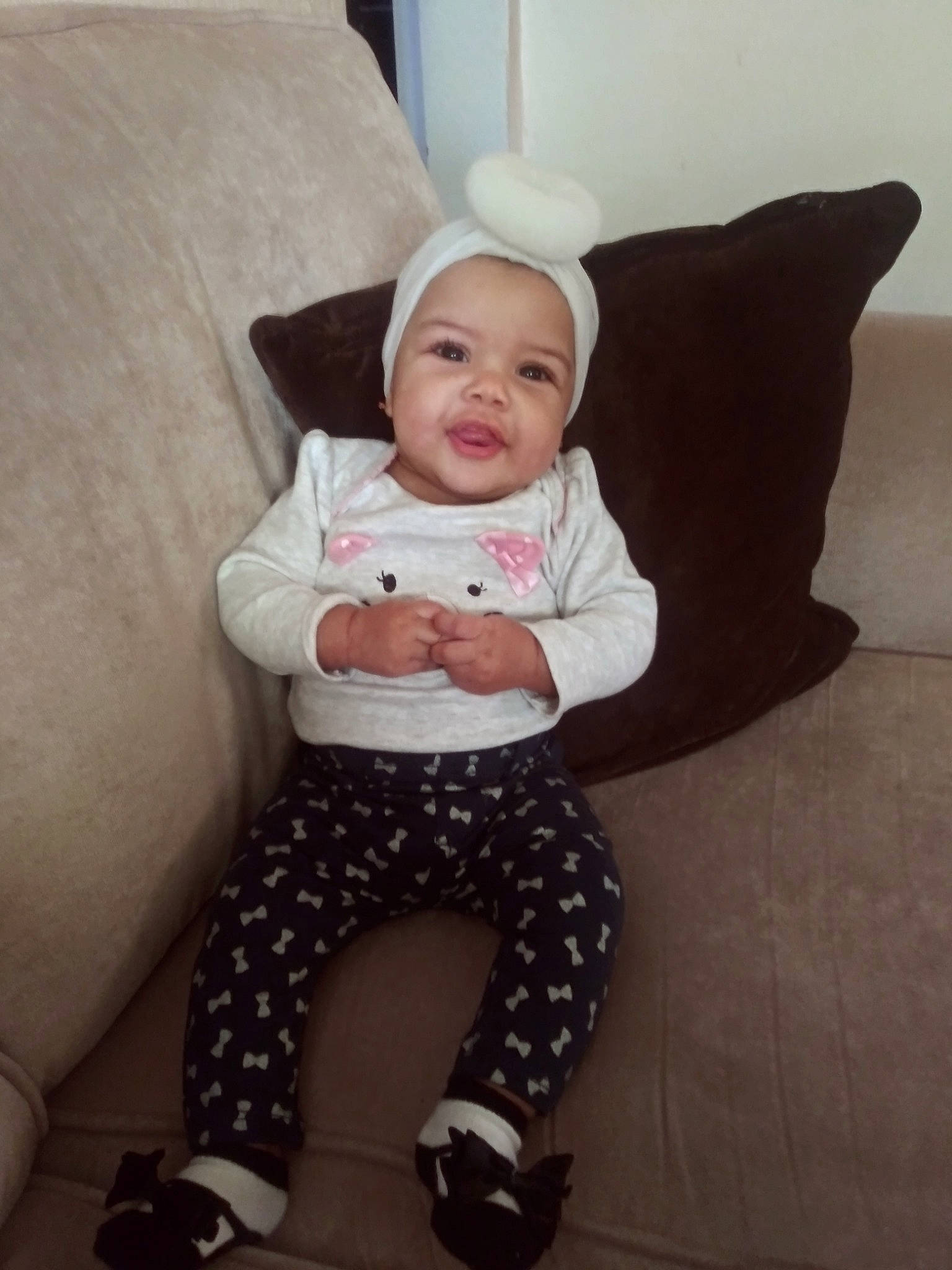 Valentina is registered to the contest to win money with this photo: baby, child, headwear, leg, person, pink, sitting, skin, smile, toddler