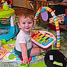 Jordy joined the competition — help win amazing prizes! toddler, child, toy, play_mat, indoor, smiling, colorful, floor, carpet, furniture, person, baby_toys, clothing, cute, happy, young_child, playtime, bright_colors, household, developmental_toys