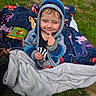 toddler, child, smiling, hoodie, blue, blanket, outdoor, grass, tree, nature, happy, sitting, playful, cute, person, clothing, baby, toy, fabric, daylight