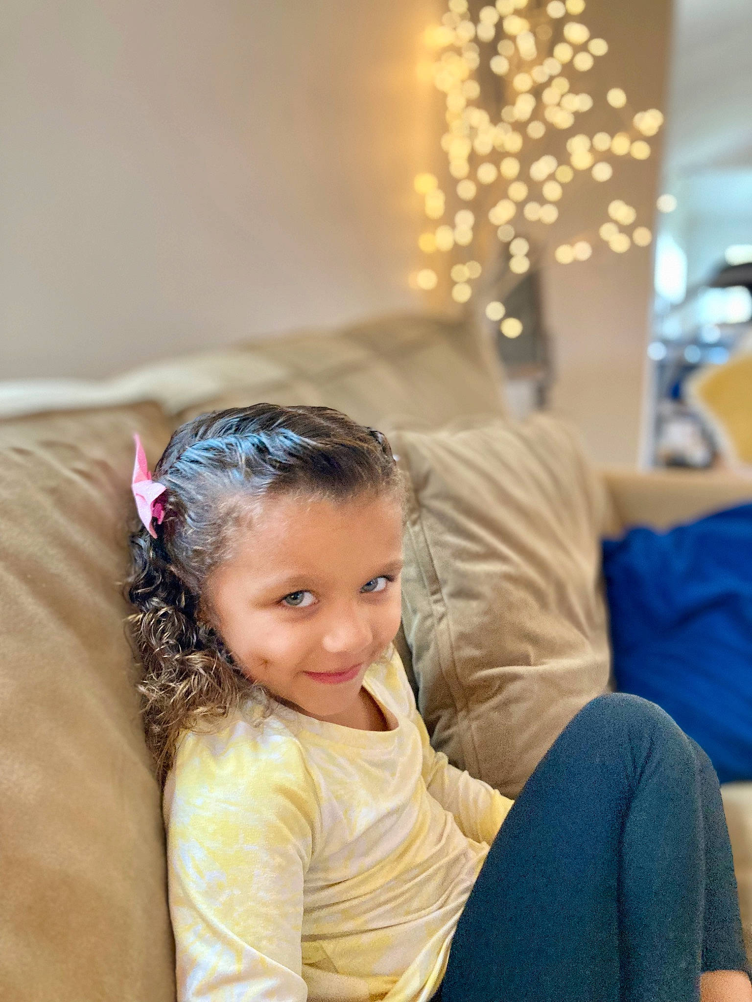 Korrah is registered to the contest to win money with this photo: arm, blond, child, comfort, couch, dress, event, flash_photography, flooring, formal_wear, fun, hairstyle, happy, human_leg, jewellery, joy, leisure, long_hair, person, sitting