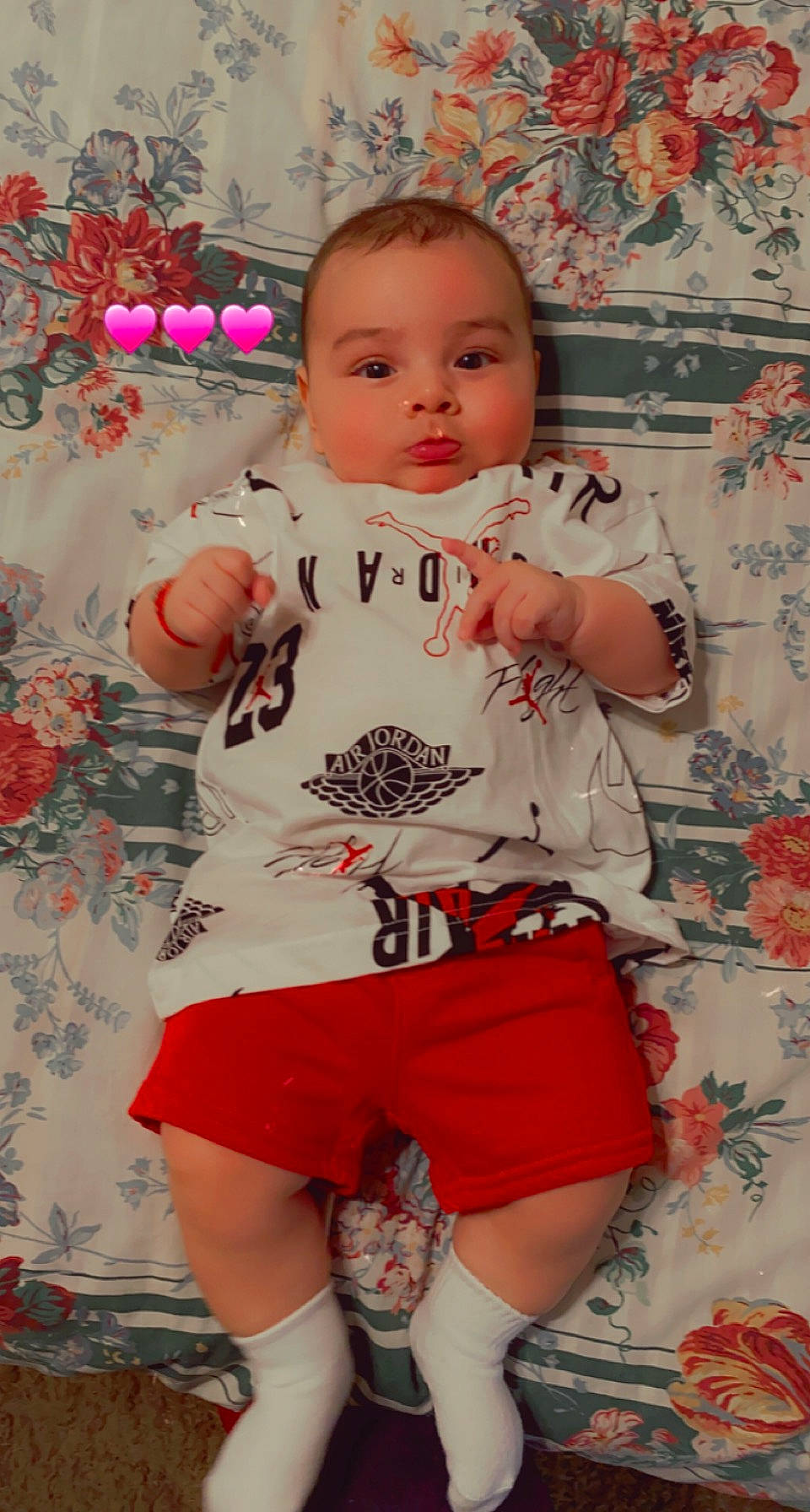 Jeffrey is registered to the contest to win money with this photo: baby, baby_toddler_clothing, cheek, face, facial_expression, hair, hairstyle, happy, head, iris, mouth, organ, person, pink, shorts, skin, sleeve, t_shirt, thigh, toddler