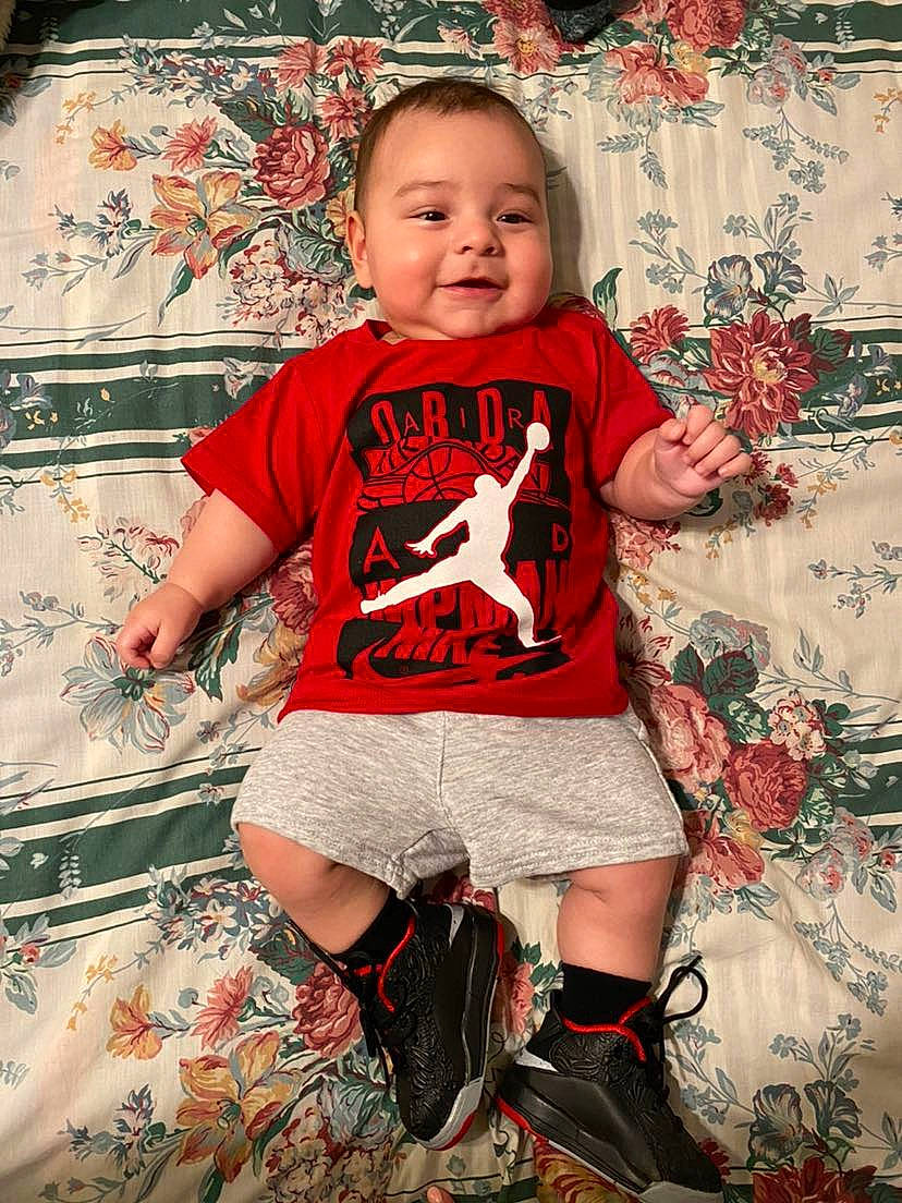 Jeffrey is registered to the contest to win money with this photo: baby_toddler_clothing, child, cool, eye, flash_photography, hairstyle, happy, iris, joy, pattern, person, pink, product, red, shorts, sleeve, smile, style, t_shirt, textile