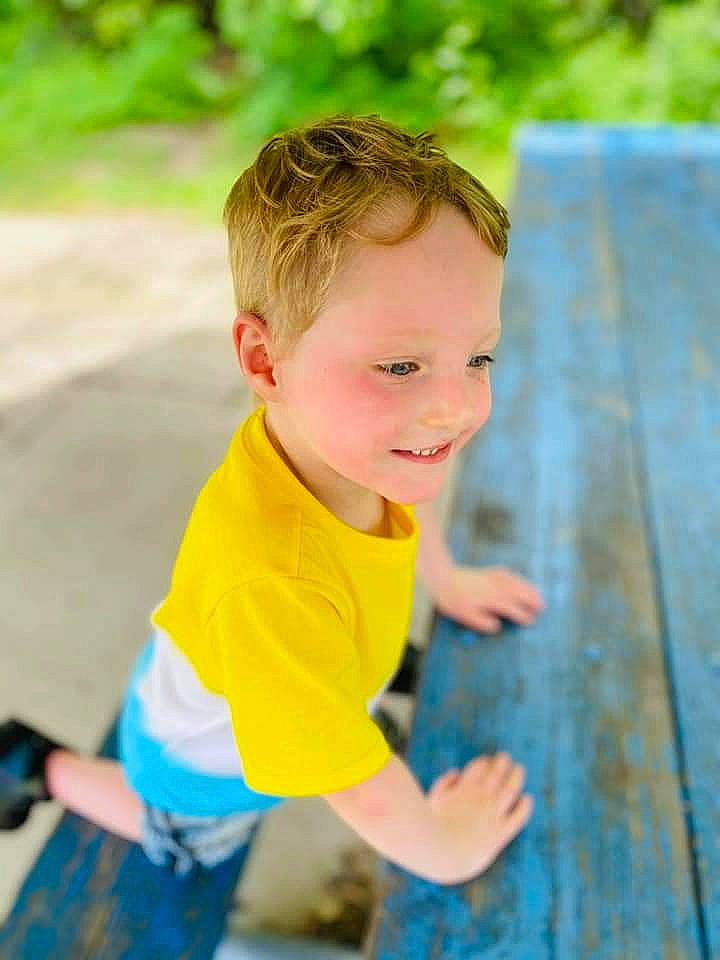 Brentley joined the competition — help win amazing prizes! arm, child, city, electric_blue, fun, grass, happy, human_body, joy, leisure, outdoor_play_equipment, people_in_nature, person, plant, recreation, sitting, smile, t_shirt, toddler, tree