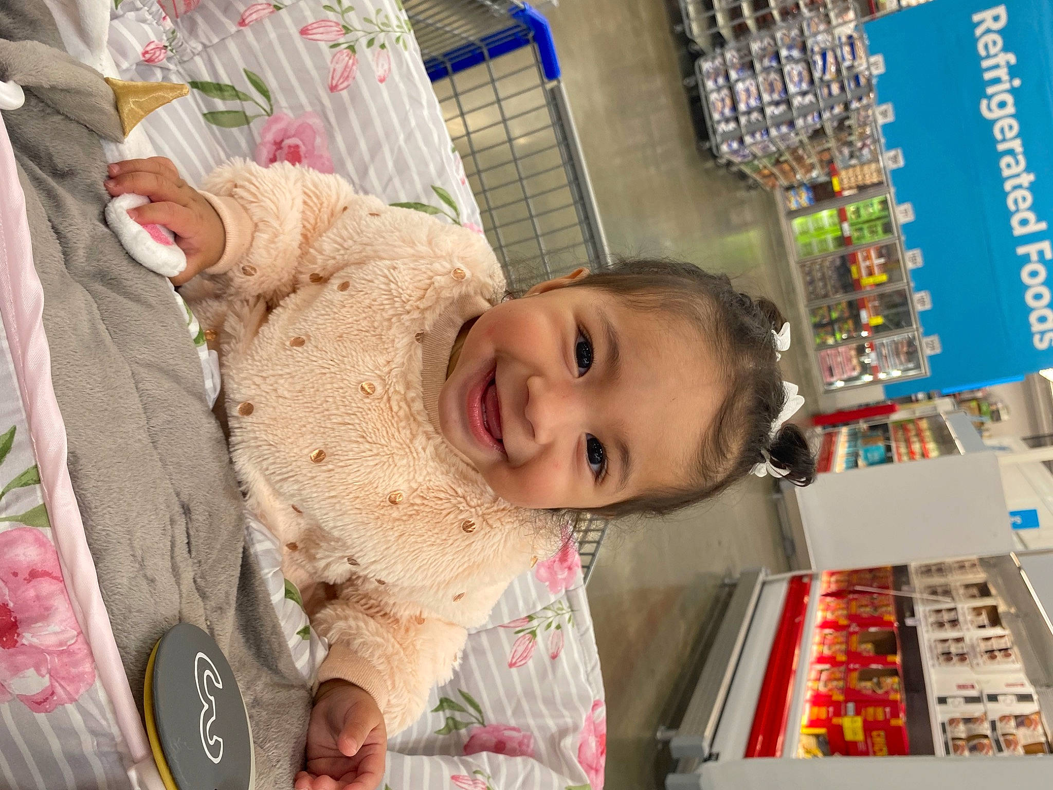 Eliana joined the competition — help win amazing prizes! baby, baby_products, baby_toddler_clothing, building, cheek, child, convenience_store, eye, fun, happy, joy, organ, pattern, person, publication, retail, room, shelf, shelving, skin
