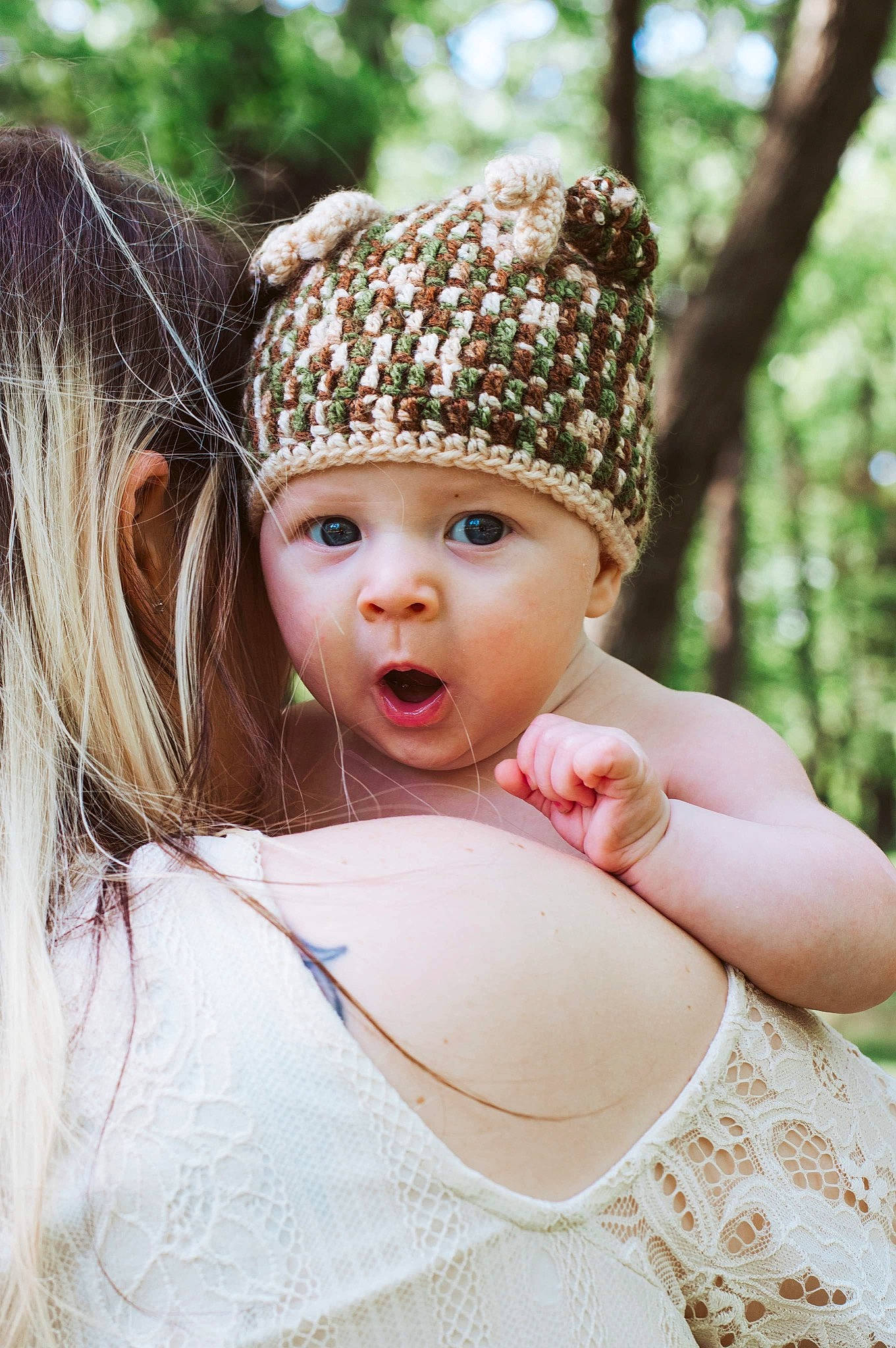 Brixton is registered to the contest to win money with this photo: cap, child, eye, flash_photography, grass, happy, hat, head, headgear, headpiece, headwear, jewellery, knit_cap, outerwear, people_in_nature, person, plant, skin, sunlight, surprise