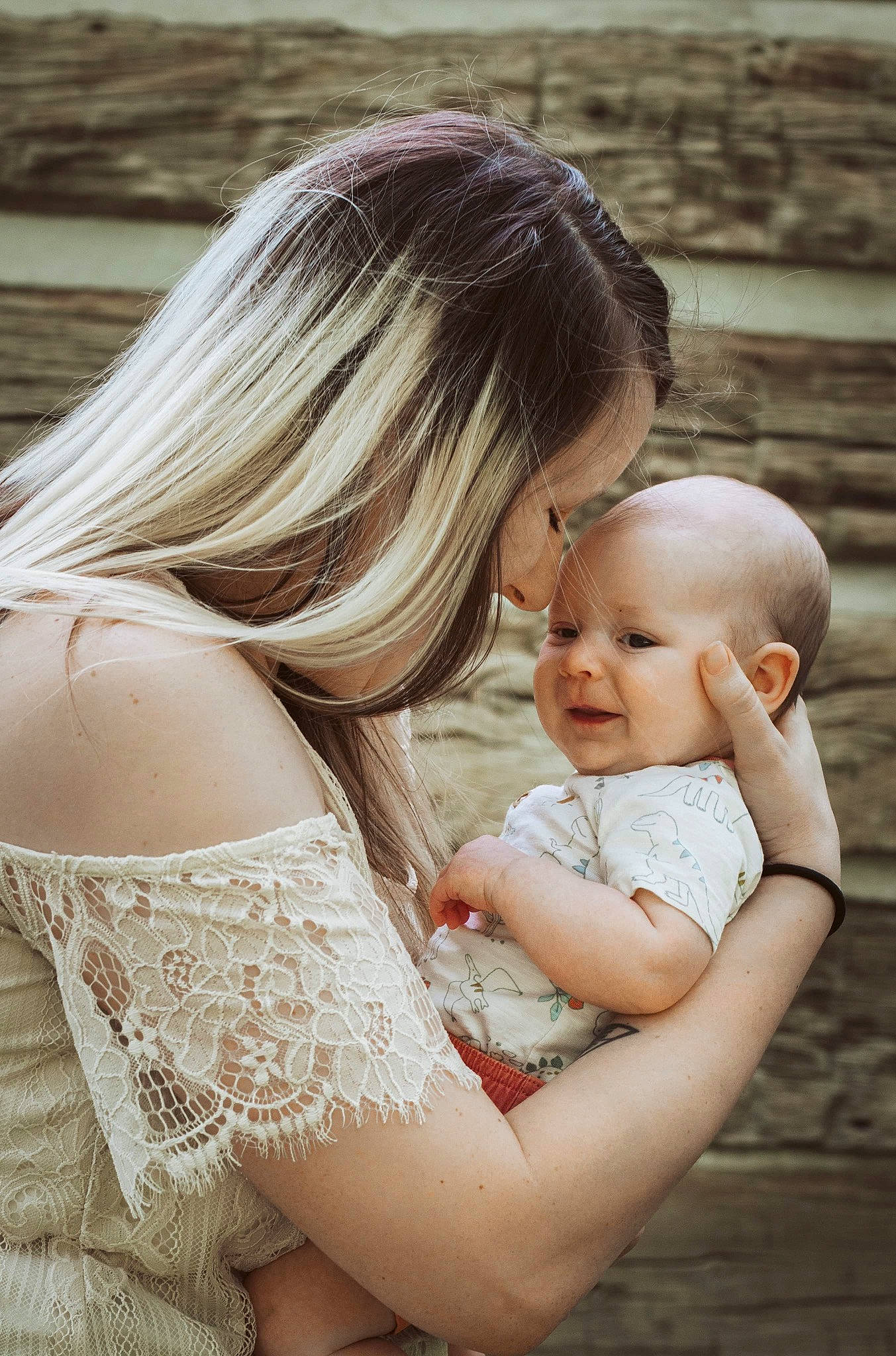 Brixton is registered to the contest to win money with this photo: baby, bridal_accessory, comfort, event, facial_expression, flash_photography, fun, gesture, grass, happy, interaction, jewellery, joint, people_in_nature, person, plant, shoulder, sitting, skin, toddler