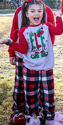 Kaylee joined the competition — help win amazing prizes! clothing, event, fun, gesture, grass, handwriting, happy, hoodie, jersey, kilt, outerwear, pattern, person, plaid, red, sleeve, smile, t_shirt, tartan, textile