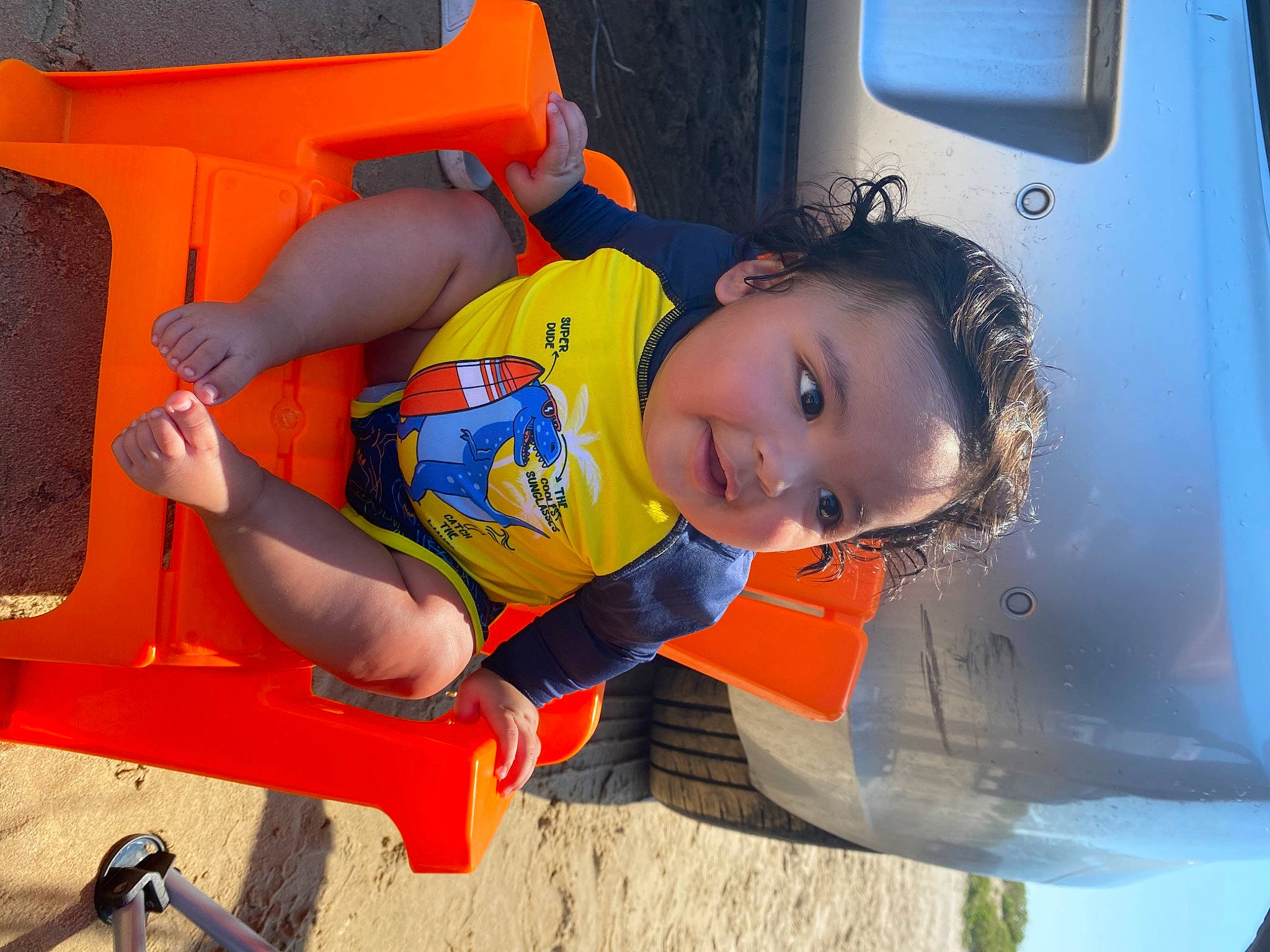 Alijah joined the competition — help win amazing prizes! auto_part, automotive_exterior, blue, child, electric_blue, fun, gas, happy, leisure, machine, motor_vehicle, orange, person, play, product, recreation, smile, t_shirt, toddler, vacation