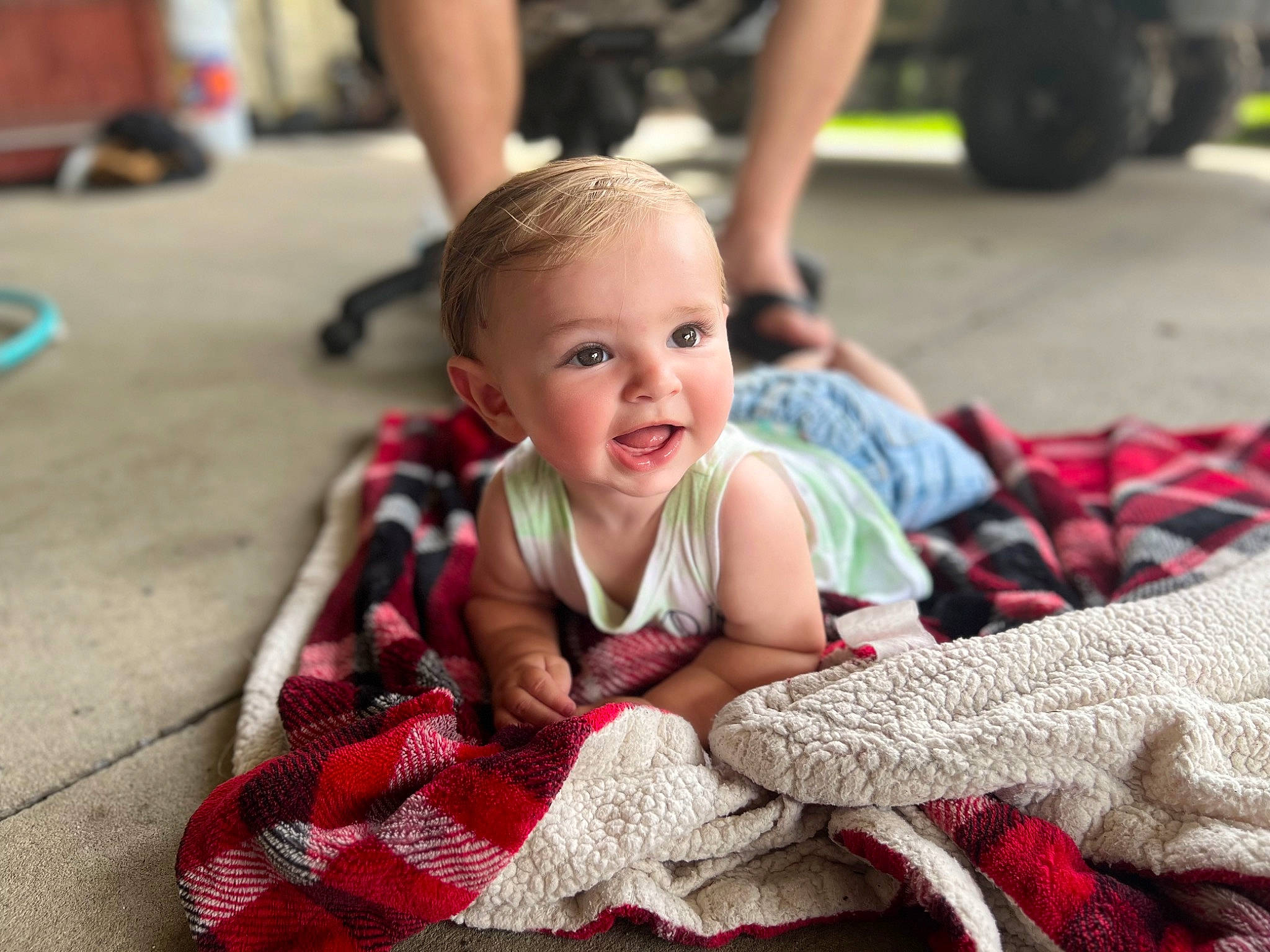 Hudson joined the competition — help win amazing prizes! baby, child, event, flooring, fun, grass, happy, leisure, pattern, person, recreation, red, shorts, sitting, smile, t_shirt, toddler, tradition, wood, woolen