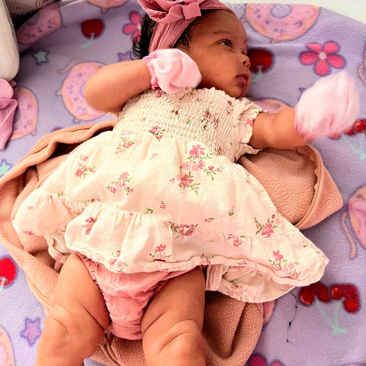 Luna Vae joined the competition — help win amazing prizes! baby, baby_girl, blanket, child, cozy, curious, cute, donut_pattern, floral_dress, flower_headband, headband, indoors, infant, lying_down, pastel_colors, pink, pink_mittens, rainbow_pattern, soft_texture, soft_toys