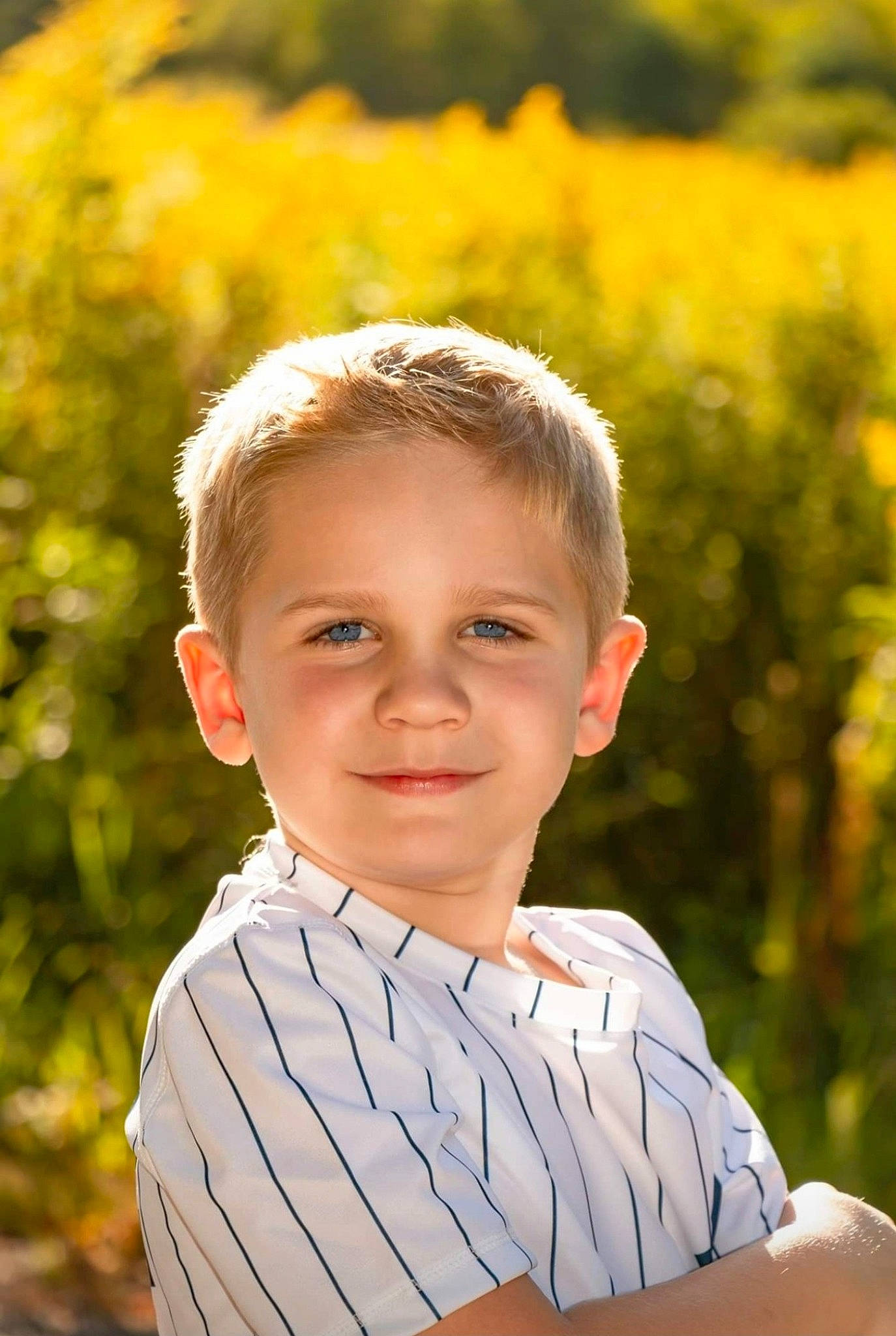 Kohen joined the competition — help win amazing prizes! child, child_model, flower, happy, joy, people_in_nature, person, photograph, photography, plant, portrait, portrait_photography, smile, summer, toddler, wildflower, yellow