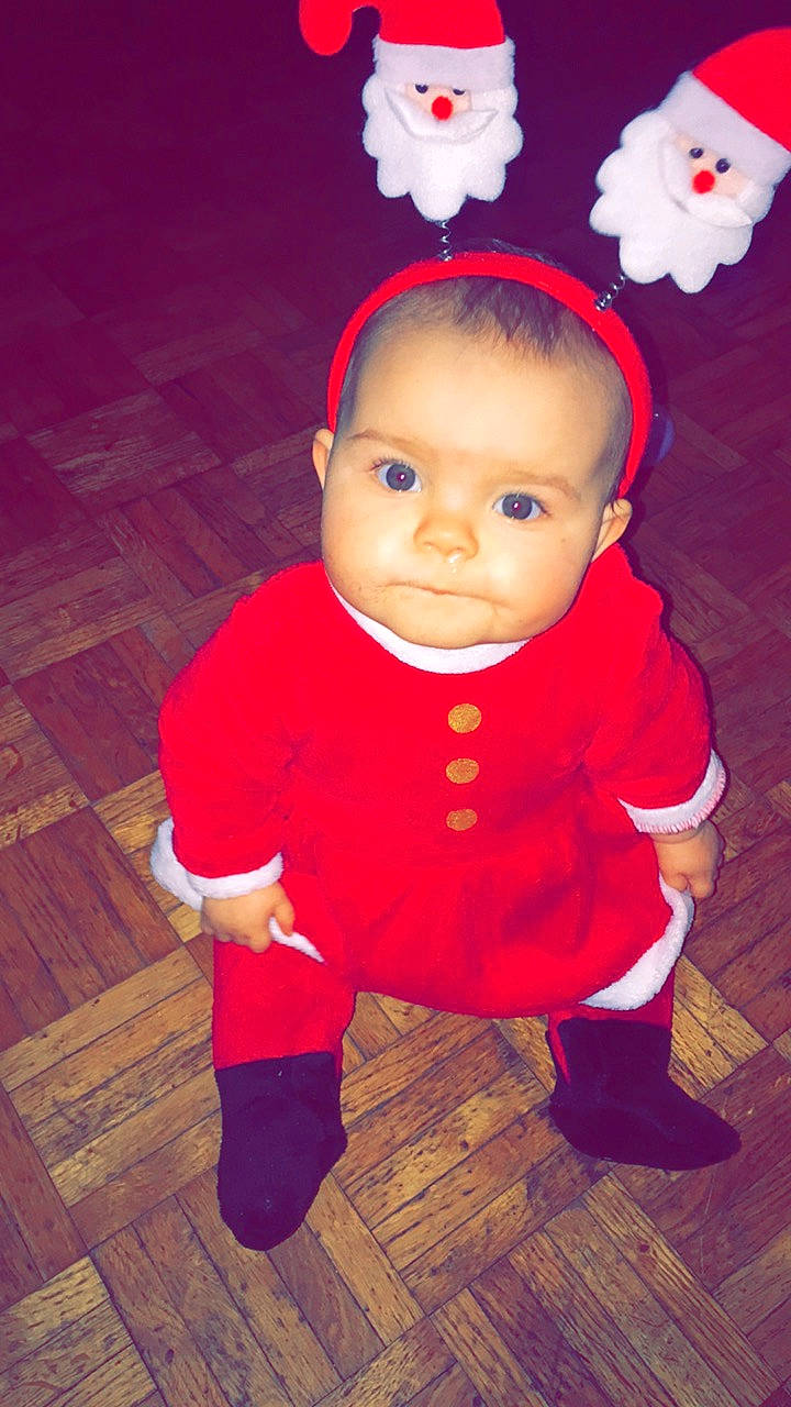 Shanna participe au concours pour gagner de l'argent avec cette photo : arm, baby, baby_toddler_clothing, cheek, chin, dress, eye, face, facial_expression, happy, head, human_body, iris, lip, nose, outerwear, person, pink, skin, sleeve