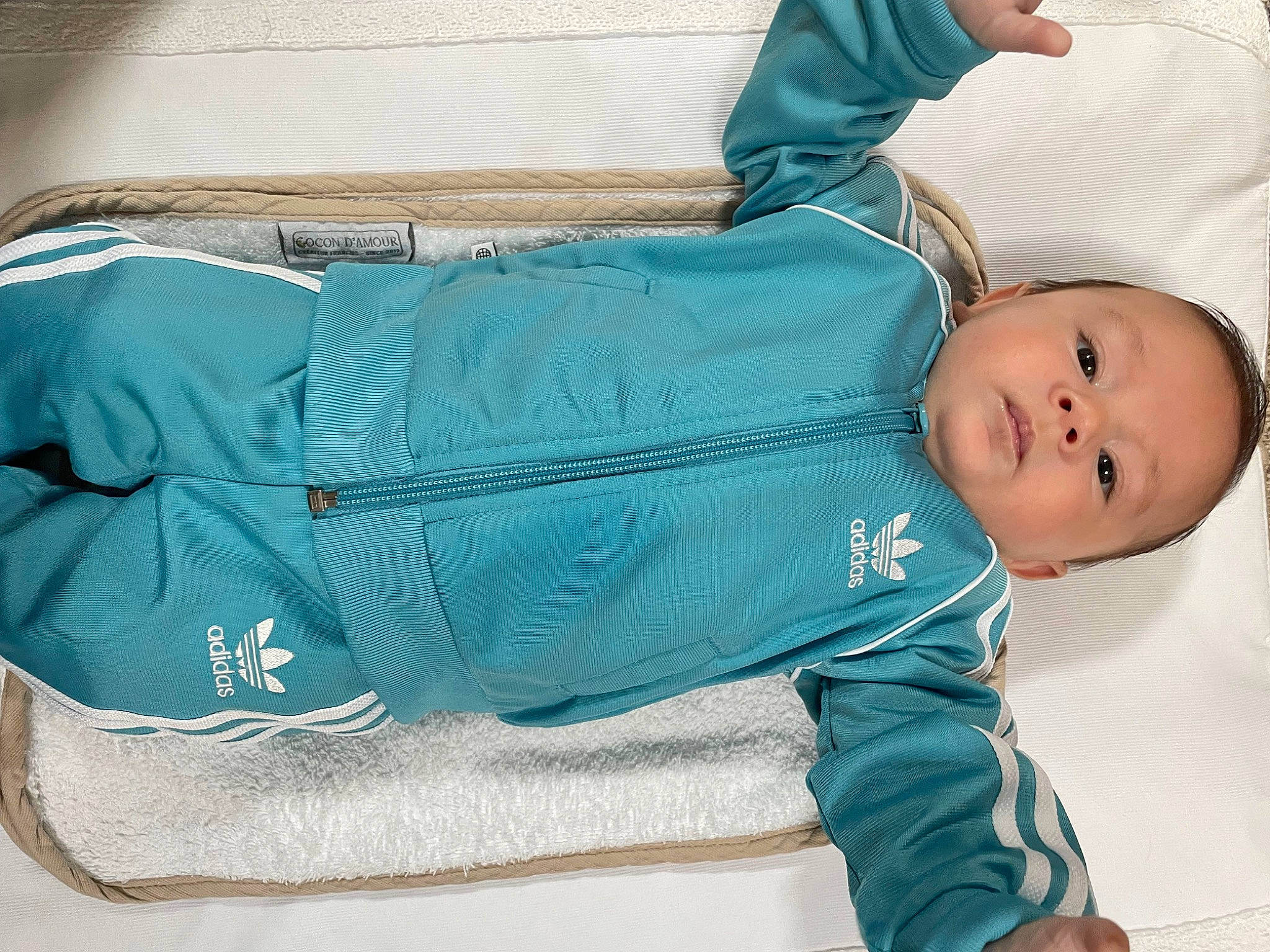 Dean participe au concours pour gagner de l'argent avec cette photo : baby, baby_products, baby_sleeping, baby_toddler_clothing, child, comfort, denim, elbow, electric_blue, fashion_accessory, jacket, pattern, person, pocket, product, sitting, sleeve, sportswear, toddler