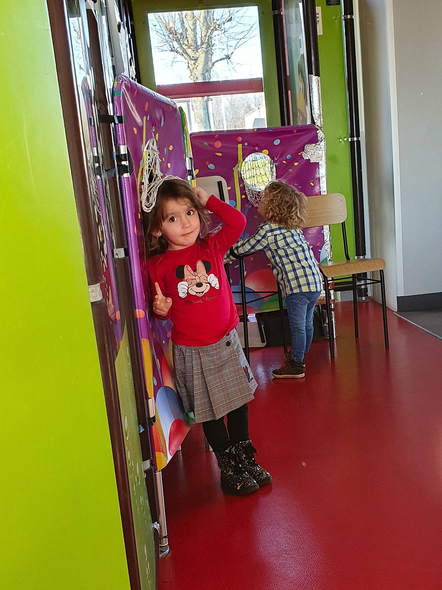 Emma participe au concours pour gagner de l'argent avec cette photo : chair, child, curtain, door, dress, fashion_design, flooring, fun, joy, leisure, magenta, person, pink, play, product, purple, room, shelf, standing, textile