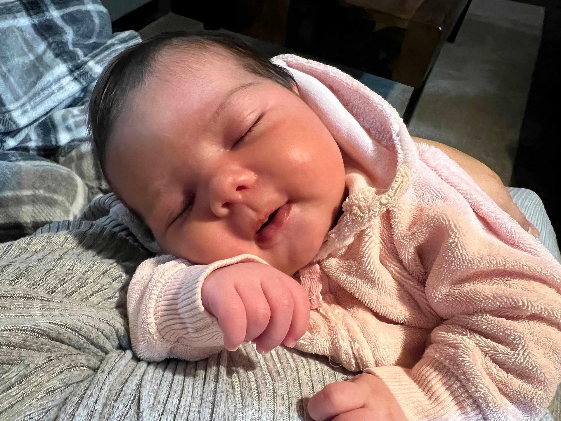 Ayla Alsadh joined the competition — help win amazing prizes! baby, sleeping, pink_hoodie, hand, face, infant, soft_texture, blanket, gray_blanket, closeup, cute, peaceful, resting, indoors, warm_clothing, portrait, child, newborn, cozy, relaxing