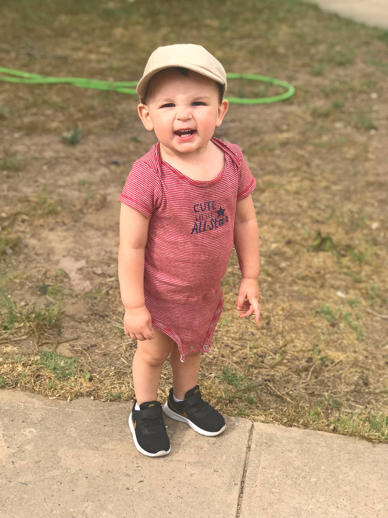Jahmir joined the competition — help win amazing prizes! baby, child, face, facial_expression, fun, grass, happy, head, headgear, headwear, people, person, pink, play, skin, smile, summer, t_shirt, toddler, vacation