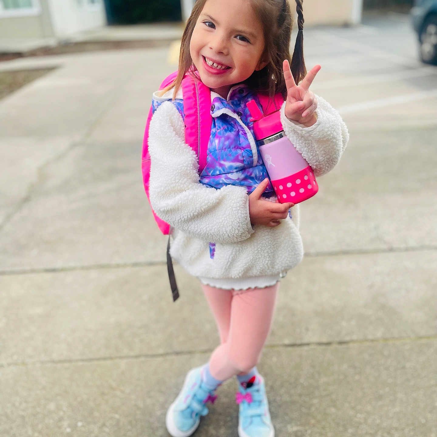 Sophia is registered to the contest to win money with this photo: bodypart, child, city, clothing, coat, face, female, finger, footwear, girl, hand, head, jacket, person, photography, portrait, road, shoe, street, urban